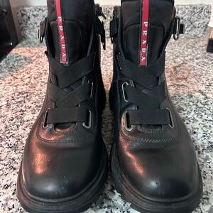 Prada Black Leather Ankle Boots with Red Accent